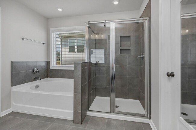 Building Photo - Sophisticated Like-New 4-Bedroom Home with Designer Finishes & Fenced Backyard!
