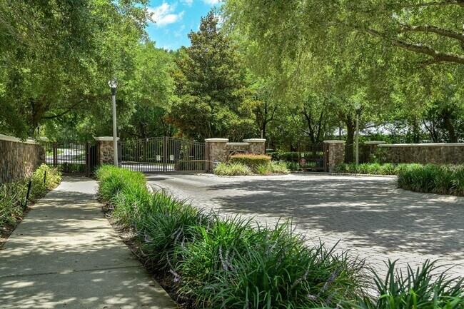 Building Photo - Expansive 4 bedroom, 3 bath remodeled home in gated community