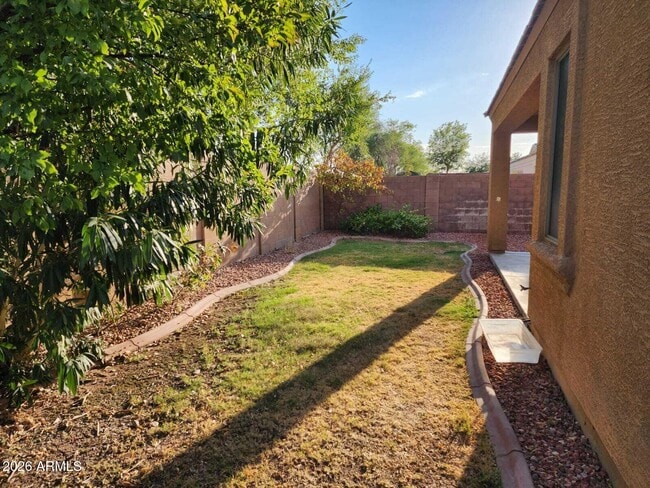 Building Photo - 7643 W Charter Oak Rd