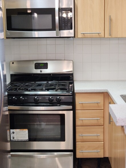 Stainless steel appliances in kitchen - 7037 La Tijera Blvd