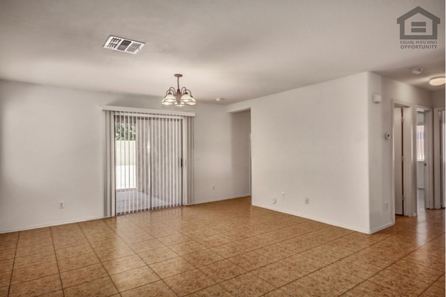 Building Photo - 7407 S Sunrise Way