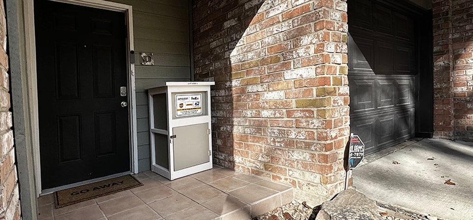 Package locker by front door - 8710 Park Ln