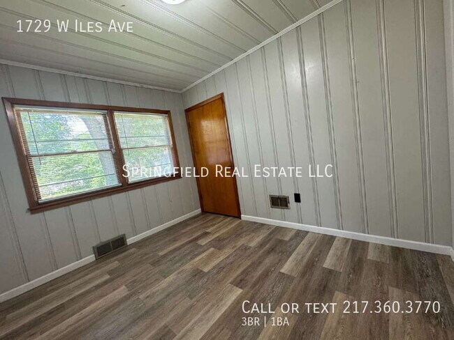 Building Photo - 1729 W Iles Ave