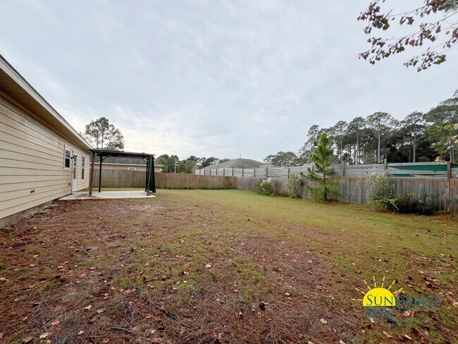 Building Photo - Stunning 4-Bedroom Home in Navarre, Just 3-Miles to Navarre Beach!