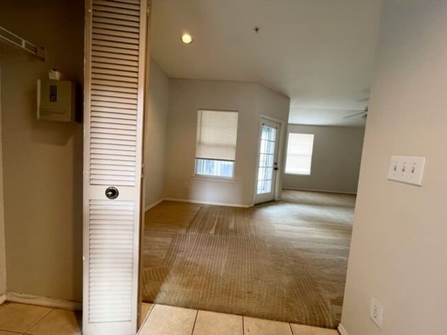 Building Photo - Move in NOW- Spacious 2 bedroom 1 bath condo on 3rd floor in gated community! Water included with...