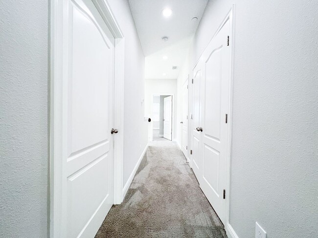 Building Photo - Luxury 4-Bedroom Townhome in Laureate Park – Now Available!