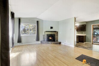 Building Photo - Eagle River Home w/ Fenced Yard, Sunroom, and Garage!