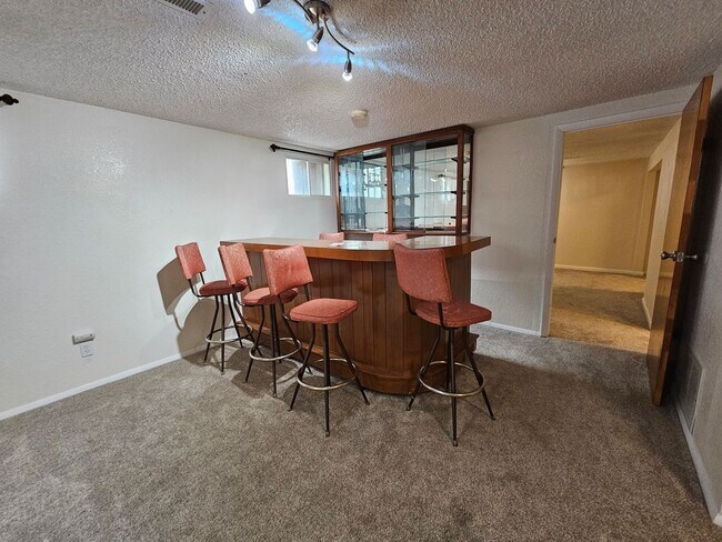 Building Photo - 4-Bedroom Home with In-Ground Pool, Solar ...