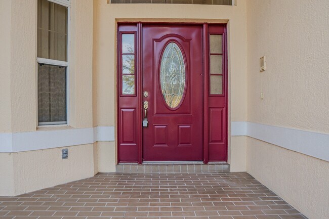 Building Photo - Spacious 5BR Home in Falcon Trace | 3-Car Garage | Screened Patio | Resort-Style Amenities Rent: ...