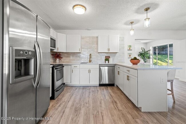 Building Photo - 7370 Holiday Dr