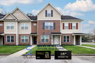 Building Photo - Move in before February 15th and choose your reward: a $250 Amazon Gift Card or a 55" Smart TV!