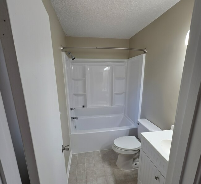 Building Photo - Corner Lot Charm: Spacious 4 Bed on Corner Lot w/ Custom Bookshelves & Private Storage Shed