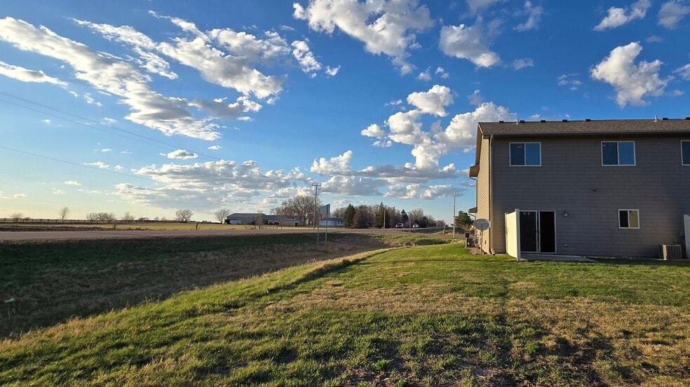 End unit with the peace and quiet you want. - 8413 W 53rd St