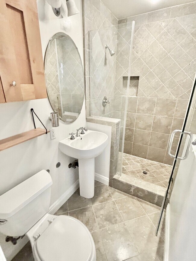 Building Photo - Beachside Living Just One Block from the Sand – Updated 1BD with Garage Parking