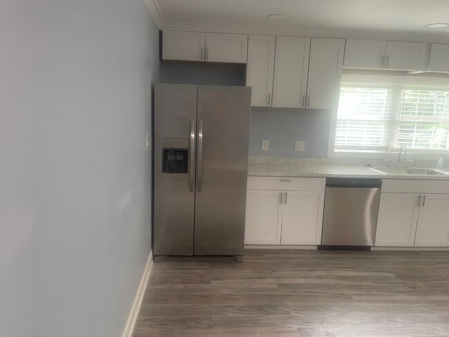 Building Photo - Now Available: Fully Renovated 6BR/4BA Home!