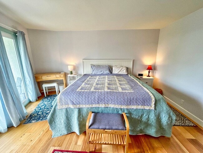 Building Photo - Steps to the beach from this Ocean View Condo with 2 car garage