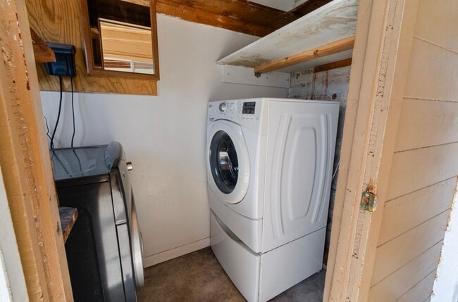 Building Photo - Available March 1, 2026. Updated 2 Bedroom 1.5 Bath Duplex with private dedicated pool.