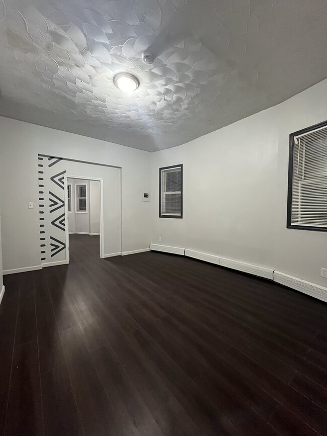 Living room new flooring and paintwork - 125 S 9th St