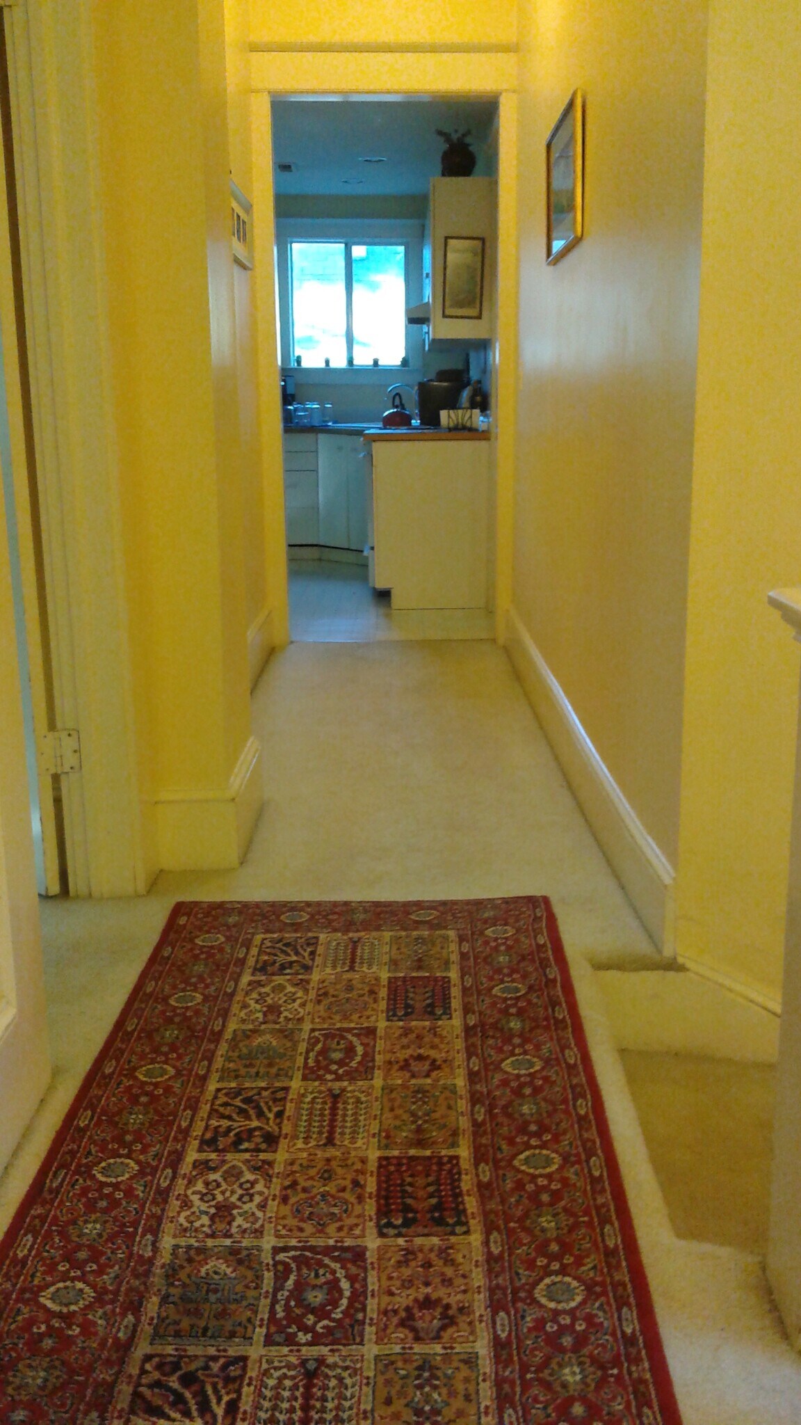 Hallway from living area to kitchen - 131 SW Hooker St