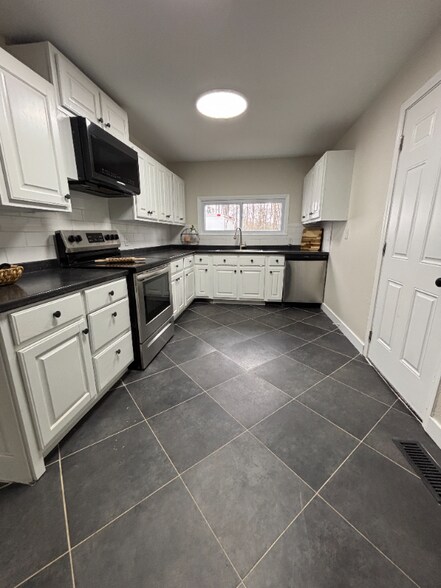 Building Photo - 1105-1107 Reynolds Rd