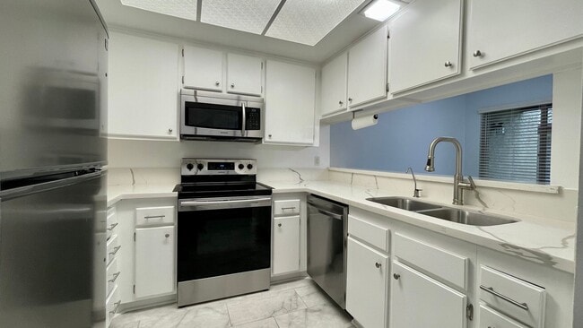 Building Photo - Beautifully Updated, 3-Bed Orcutt Condo w/ Pool and Basketball Court