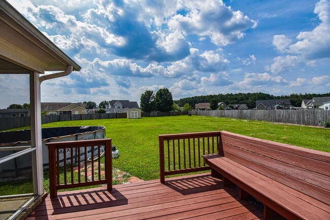 Building Photo - Coming Soon!! 4 Bedroom 2.5 Bath Nicely Renovated with Updated Fixtures! - No Pets