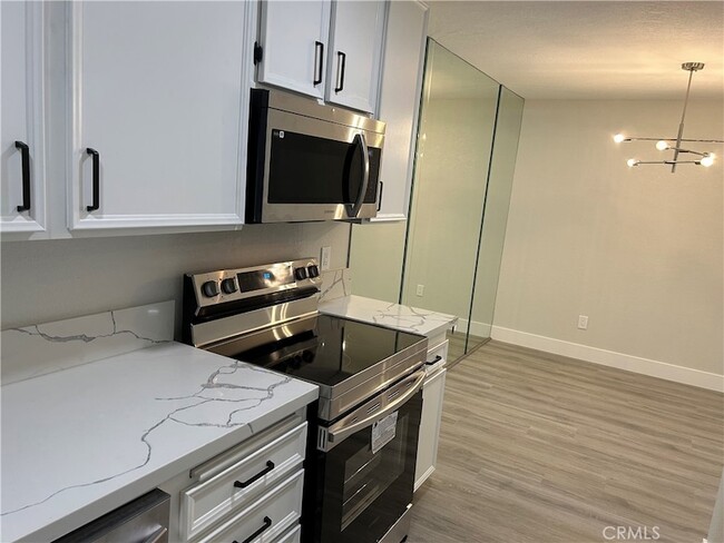 Building Photo - 2801 Los Felices Cir E