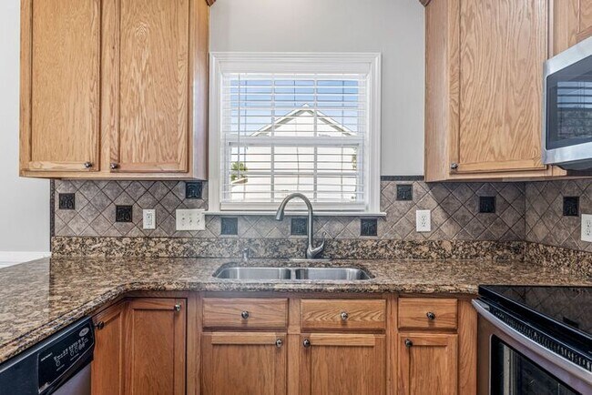 Building Photo - W. Wendover, Beautiful Home, Granite Counter-Tops, SS Appliances, Hardwoods, FP, Deck, Fenced, Ga...