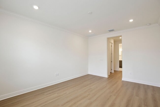 Building Photo - Gorgeous 4/3 Residence with a Private Back Lanai and a 2 Car Garage in the Delightful Laureate Pa...