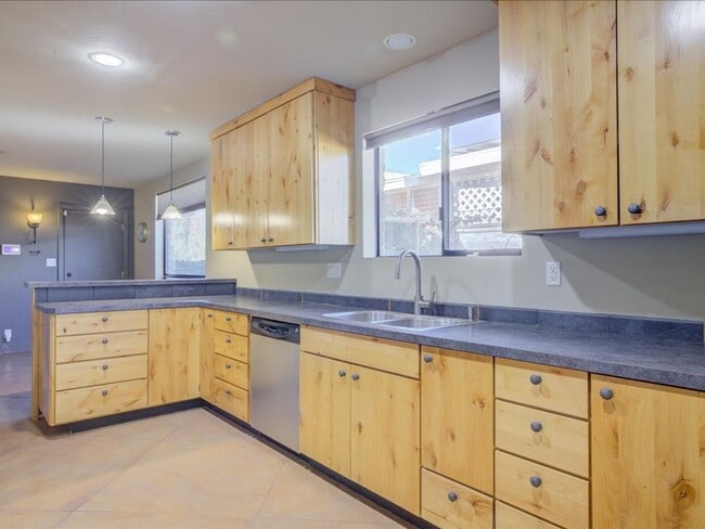 Building Photo - Stunning 4-Bedroom Home with Open Layout & Large Backyard!