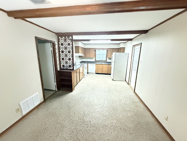 Building Photo - Welcome home to this charming 3-bedroom, 1.5-bathroom brick home featuring a spacious living and ...