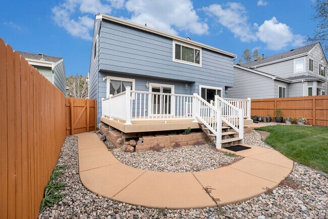 Building Photo - Spacious 4-Bedroom Home in District 20 with Huge Deck & Fenced Yard