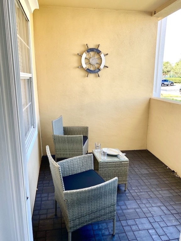 Private, covered lanai with views of pickleball/tennis and parking - 1000 Villagio Cir