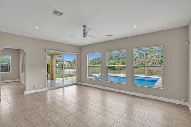 Building Photo - Great Pool Home with excellent lake View in Heron Bay, Parkland