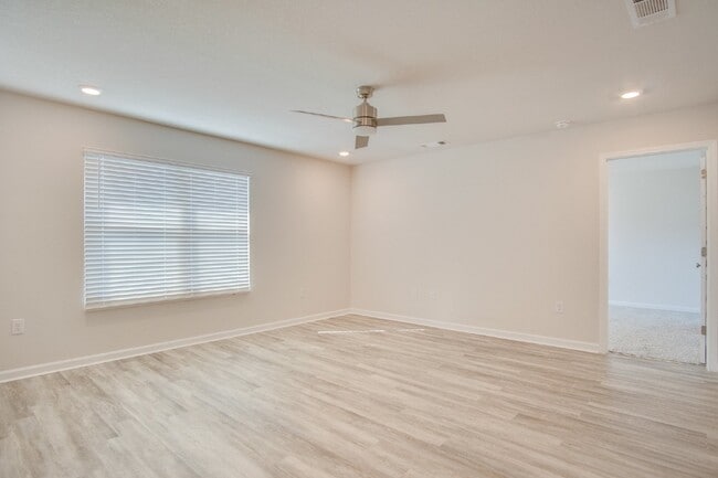 Building Photo - 4-Bed, 2-Bath Home in Woodlands Subdivision with Solar, Open-Concept Living, Modern Kitchen, Fenc...