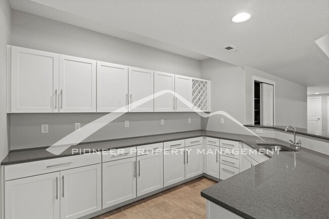 Building Photo - Elegant Ranch-Style Home with Main Floor Primary Bedroom with 3-Car Garage and Finished Basement ...