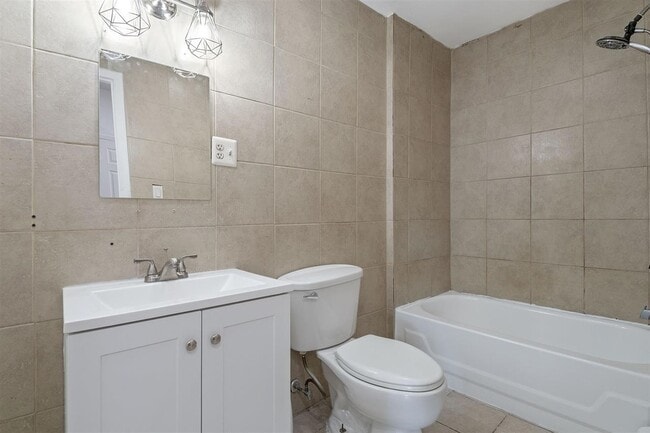 Building Photo - 310 Paterson Plank Rd