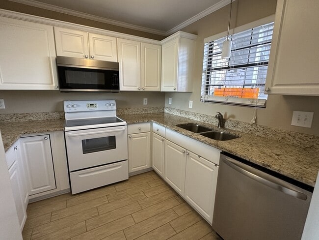 Building Photo - WATERFRONT: 2 BR 2 Bath Ground Level Condo