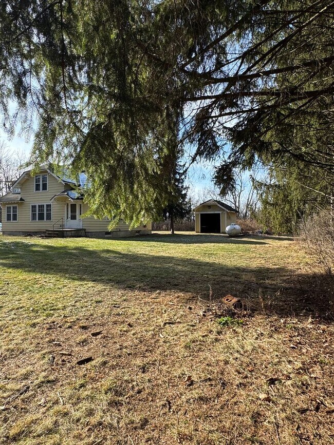 Building Photo - Charming 4-Bedroom Home in Private Setting
