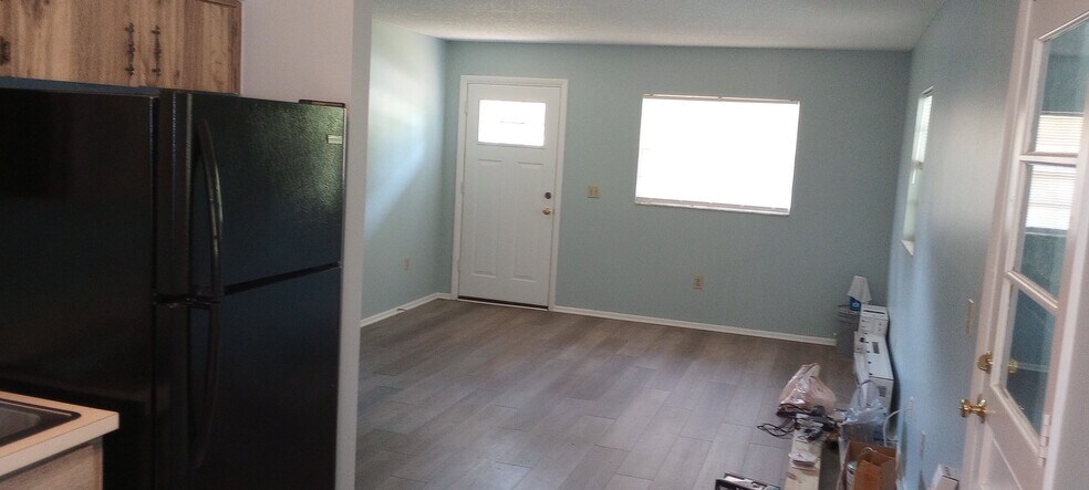 Living Room (please ignore building supplies) - 105 Magnolia Dr
