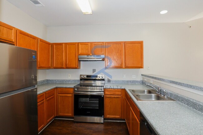 Building Photo - Move in before January 31st and choose your reward: a $250 Amazon Gift Card or a 55" Smart TV!