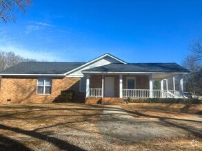 Building Photo - 3BR/3BA Brick Farmhouse on 4.4 Acres – Pic...