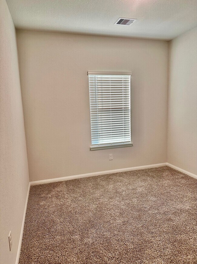 The secondary bedrooms all feature carpet, spacious closets and blinds! - 507 Turtle Dove Dr
