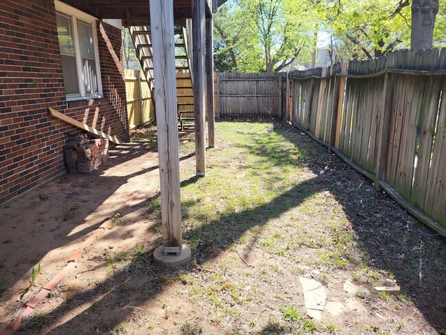 Building Photo - Studio loft next to UCO campus with deck and fenced yard