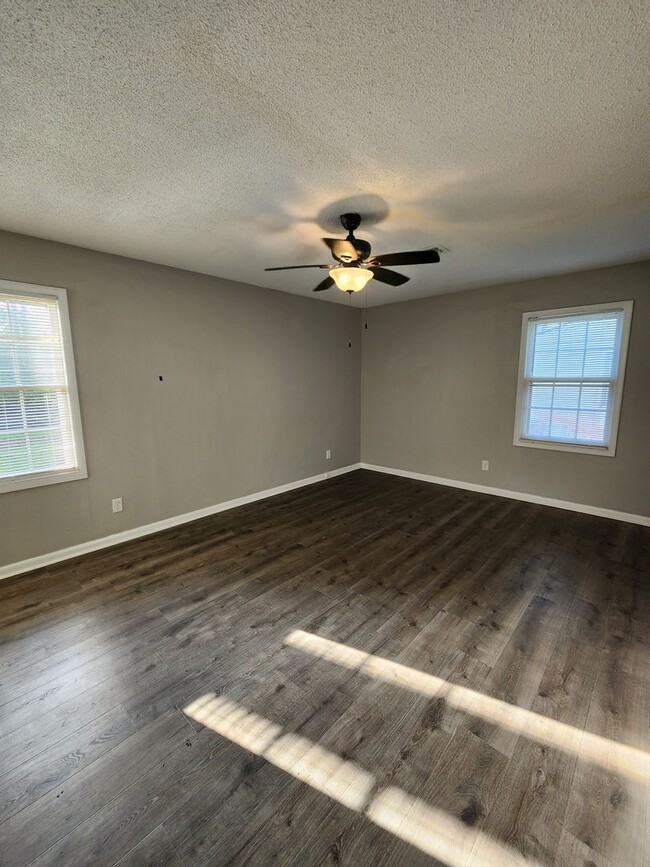 Building Photo - Spacious Brick Home with Modern Upgrades &...