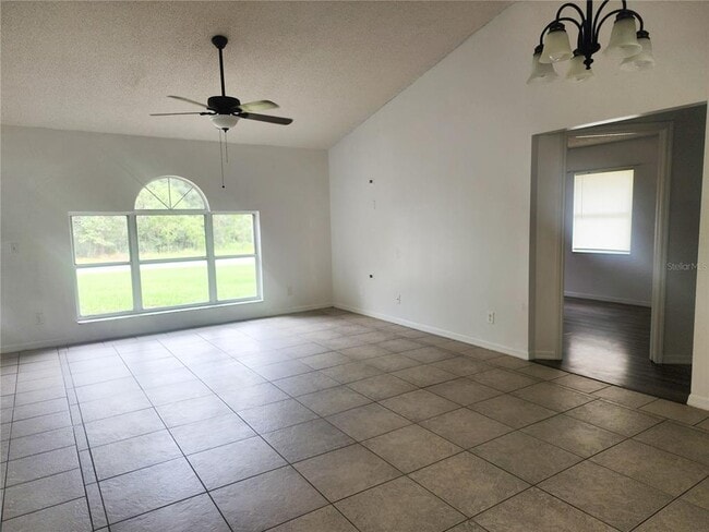 Building Photo - 9392 N Sandree Dr