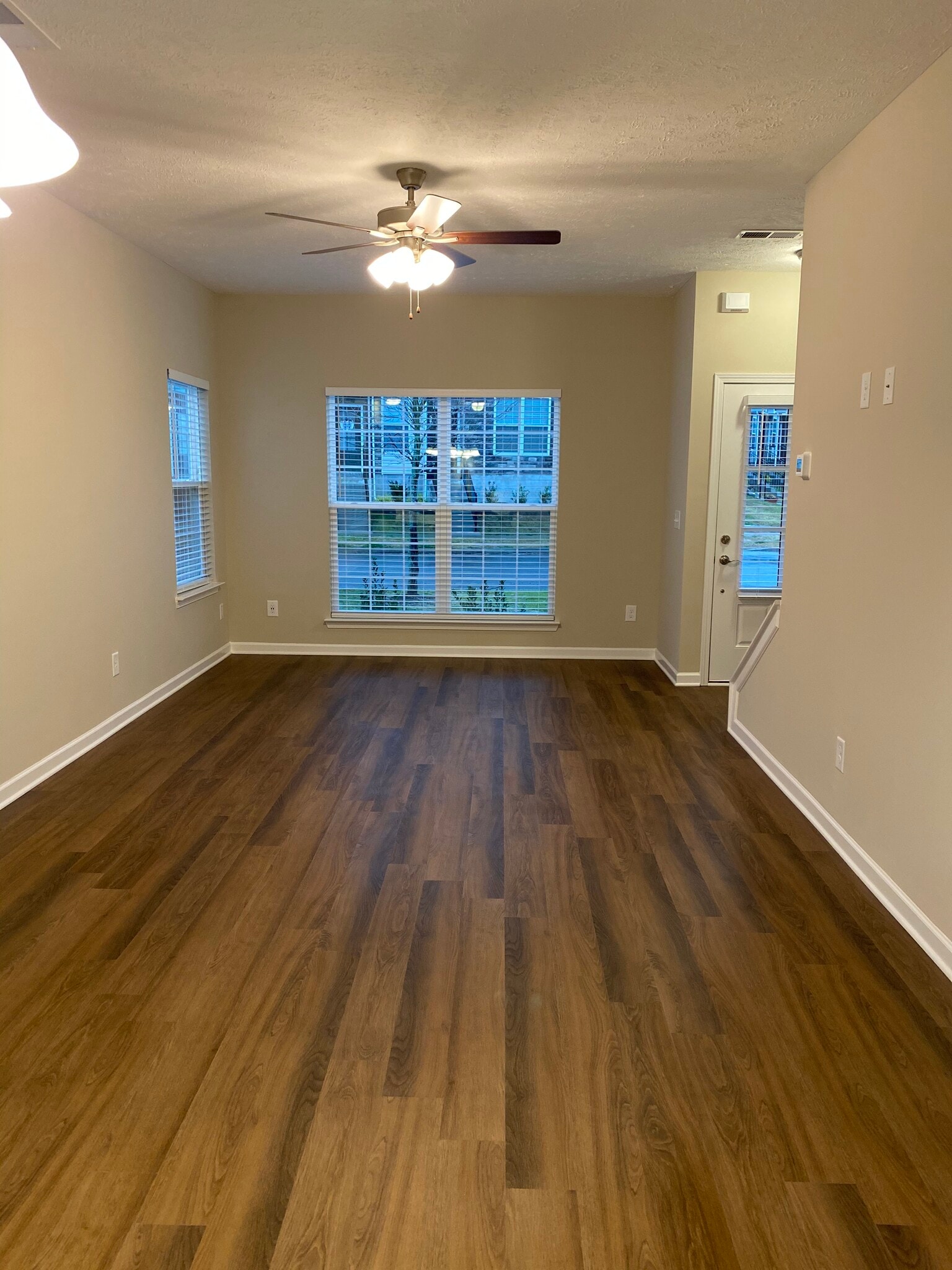 Open floor plan living and LVP waterproof flooring - 5497 Cedar Ash Crossing