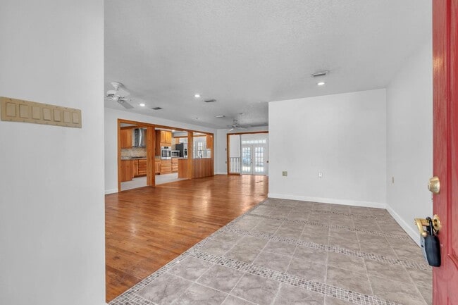 Building Photo - Charming home with large garage & attached...