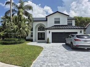 Building Photo - 5820 SW 58th Ct