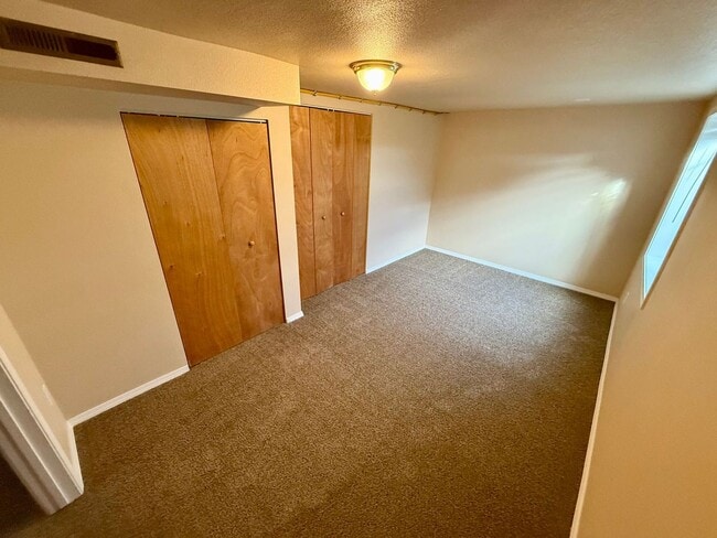 Building Photo - **For Rent: Spacious 4-Bedroom Home with 2...